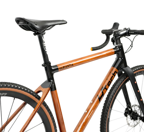 HTech Bikes Variantia wooden gravel bike studio shot fitted with Brooks C15 saddle