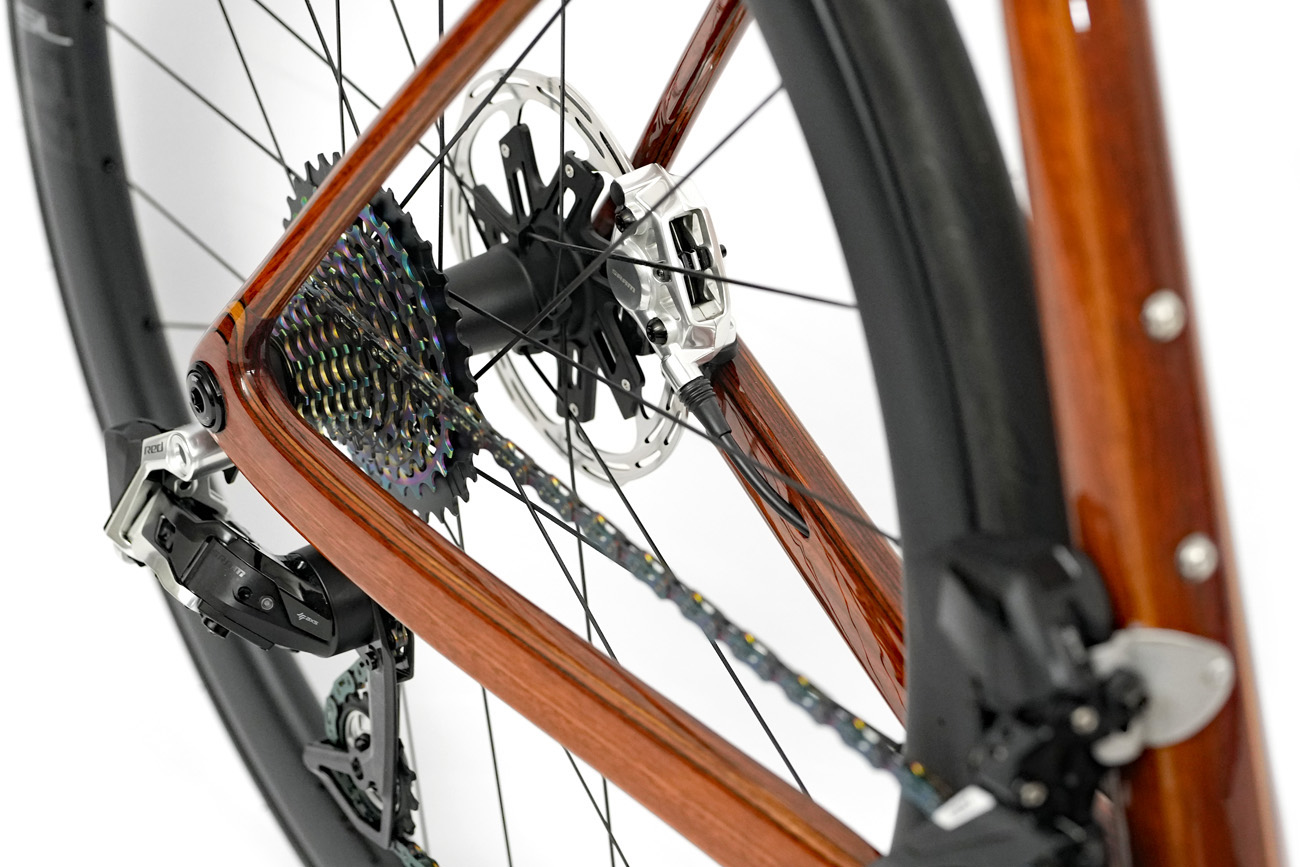 HTech Aeriform's SCR laminated stays with UDH Hanger, SRAM Red E1 rear derailleur and brake caliper