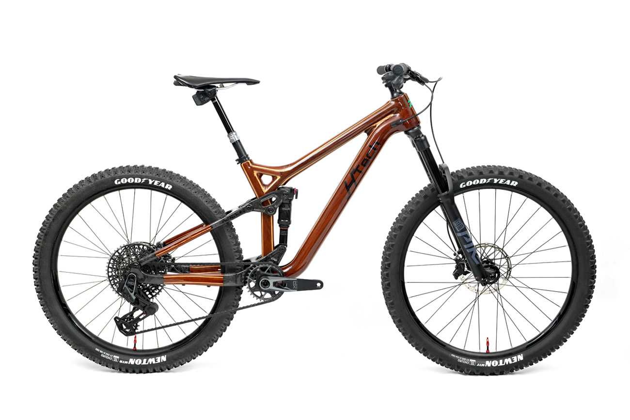 Custom HTech enduro mountain bike drive side profile, Jarrah wood frame with SRAM XO Transmission groupset